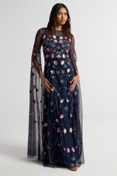 Azalea Navy Floral Cape Sleeve Maxi Dress by Frock and Frill with embroidered floral detail, flowing cape sleeves and modest evening design.