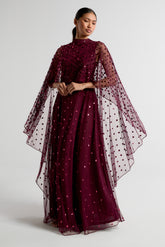 Elysia Purple Cape Dress with flowing floor-length silhouette, subtle sequin embellishments, and elegant cape overlay for weddings and evening occasions