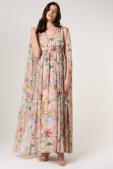 Melia floral print cape sleeve maxi dress by Frock and Frill with vibrant floral pattern and flowing silhouette designed for elegant occasion wear styling