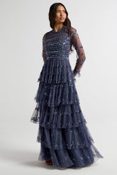 Nerissa dusty navy blue sequin tiered maxi dress with full-length sleeves, perfect for weddings, black tie balls and formal occasions.