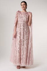 Peony pink embellished cape sleeve maxi dress with sheer long cape sleeves and cascading sequin detailing