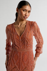 Amber burnt orange embellished maxi dress with V-neckline and long sleeves