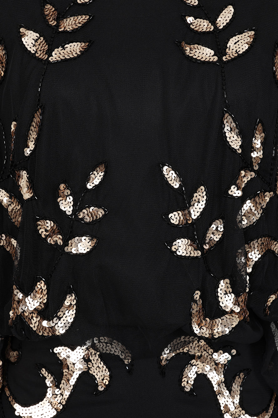 Black maxi dress with gold sequin floral embellishment, flowing sheer sleeves and full-length silhouette, Ambretta by Frock and Frill.