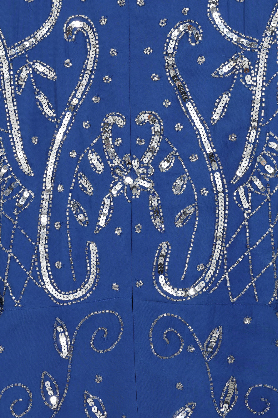 Blue Aramina Maxi Dress by Frock and Frill, featuring elegant silver beadwork and a modest floor-length silhouette, perfect for weddings and evening events.