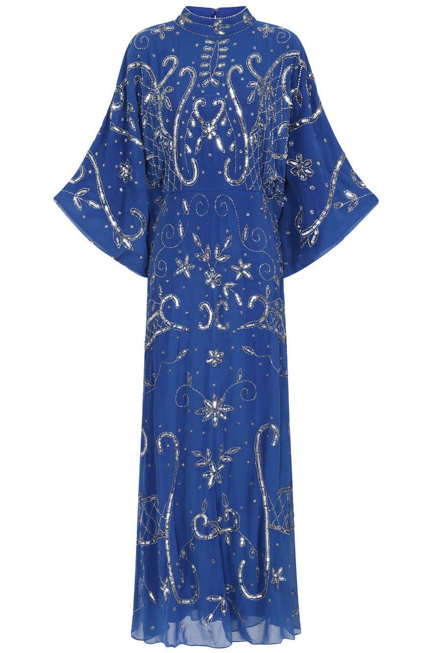 Blue Aramina Maxi Dress by Frock and Frill, featuring elegant silver beadwork and a modest floor-length silhouette, perfect for weddings and evening events.