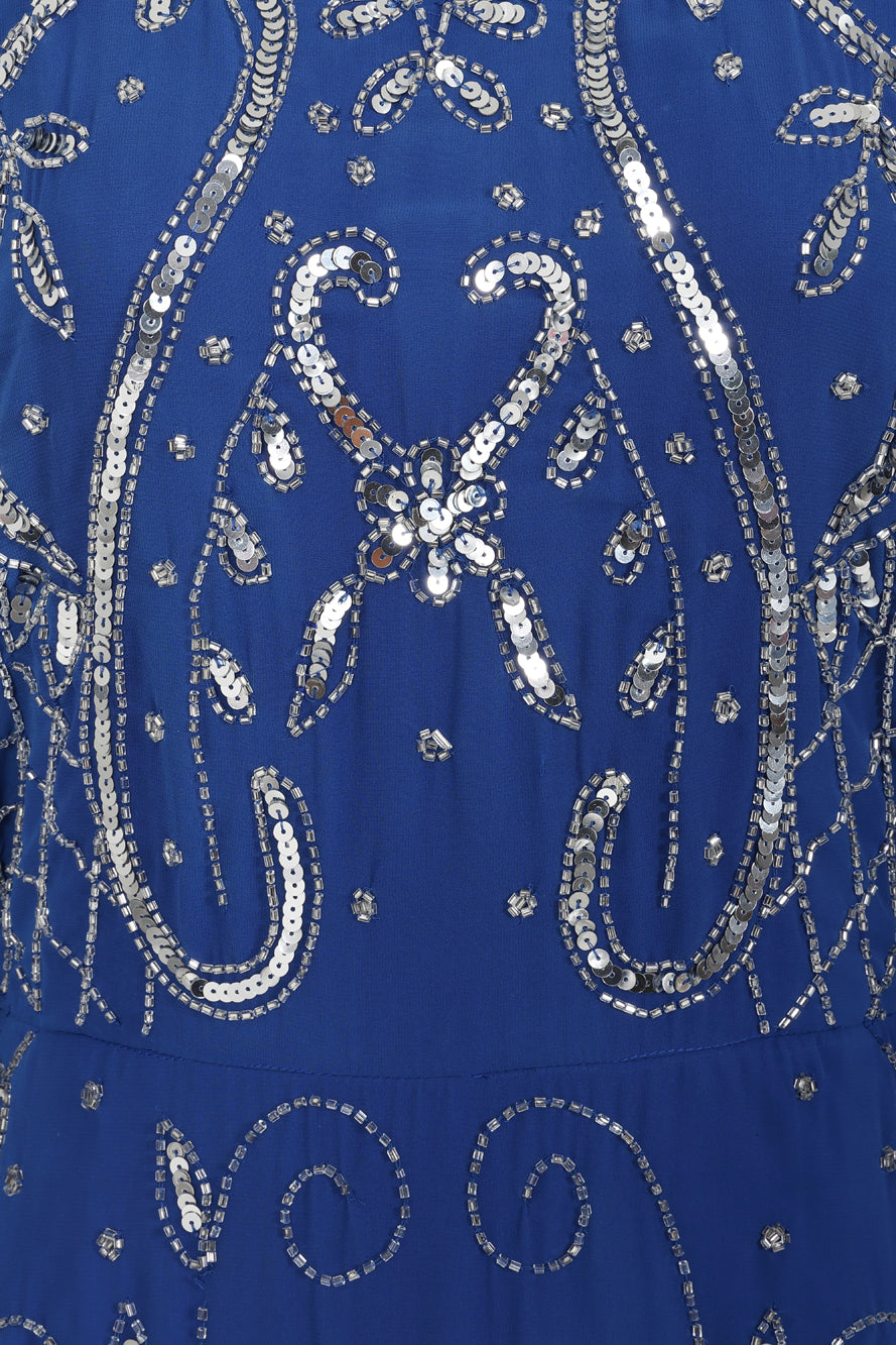 Blue Aramina Maxi Dress by Frock and Frill, featuring elegant silver beadwork and a modest floor-length silhouette, perfect for weddings and evening events.