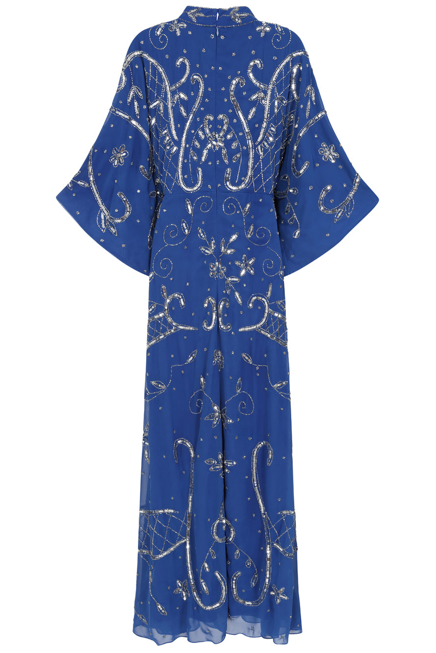 Blue Aramina Maxi Dress by Frock and Frill, featuring elegant silver beadwork and a modest floor-length silhouette, perfect for weddings and evening events.