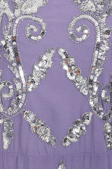 Ava lilac embellished midi dress with silver beadwork, relaxed sleeves and elegant cowl back detail for special occasions.