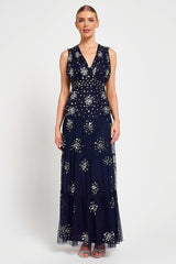 Aveline navy embellished sleeveless maxi dress with v-neck bodice, silver beadwork and tiered skirt, full-length formal occasion dress