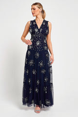 Aveline navy embellished sleeveless maxi dress with v-neck bodice, silver beadwork and tiered skirt, full-length formal occasion dress