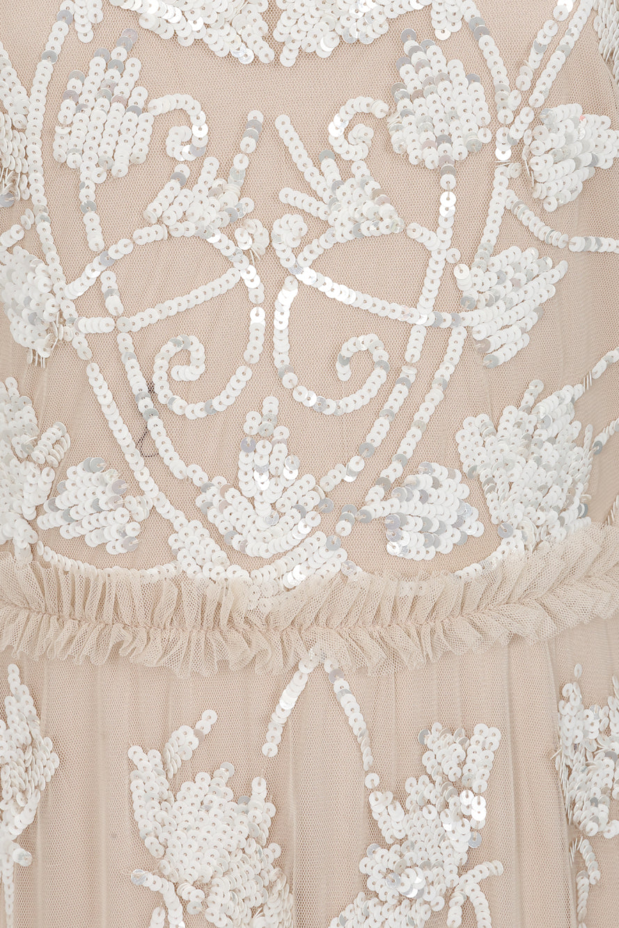 Elowen long sleeve embellished maxi dress by Frock and Frill UK in neutral tones with intricate white beadwork, modest style for weddings and formal occasions.