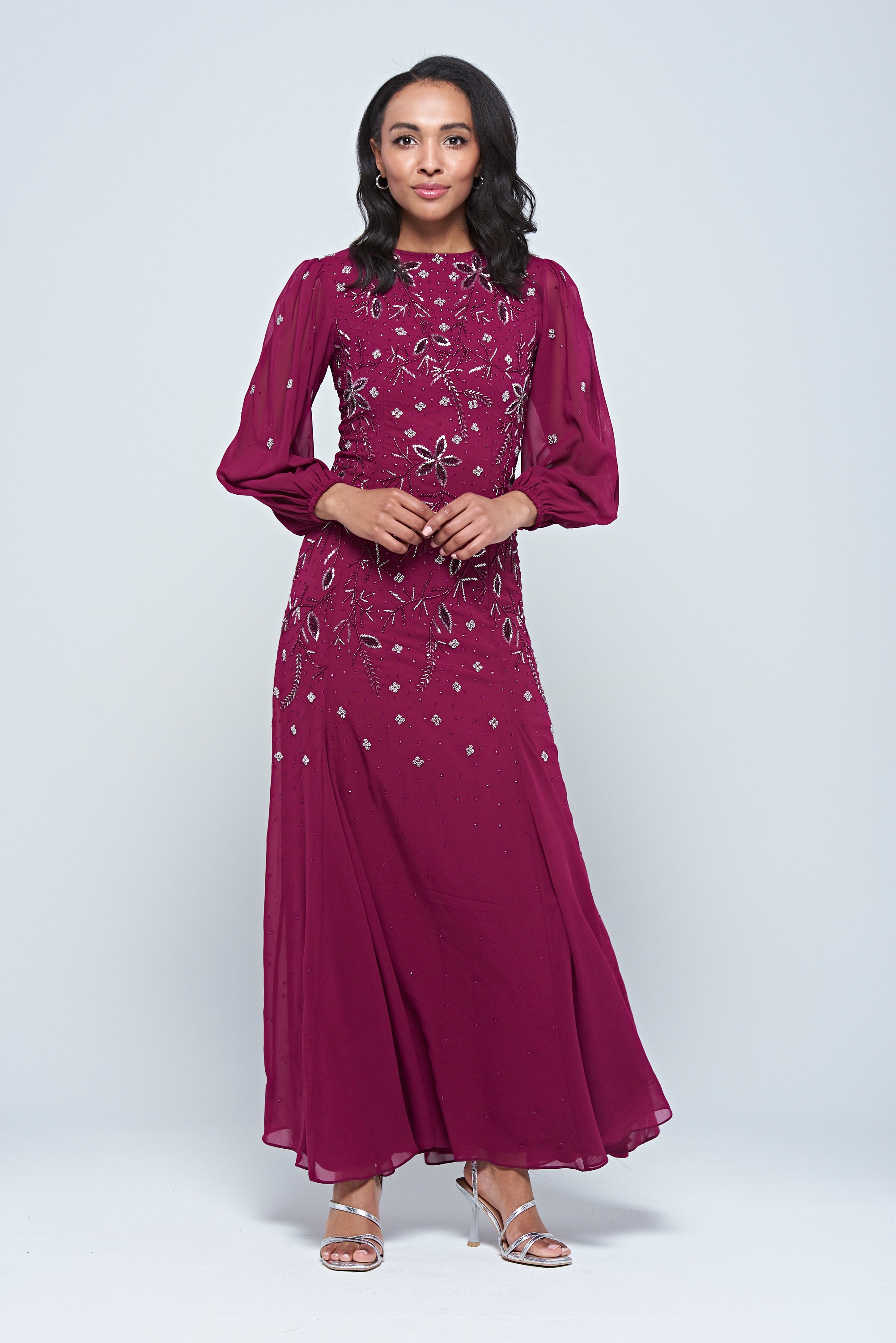 Emilia purple floral embellished long sleeve maxi dress with fitted bodice and flowing skirt, designed for elegant modest occasion wear.
