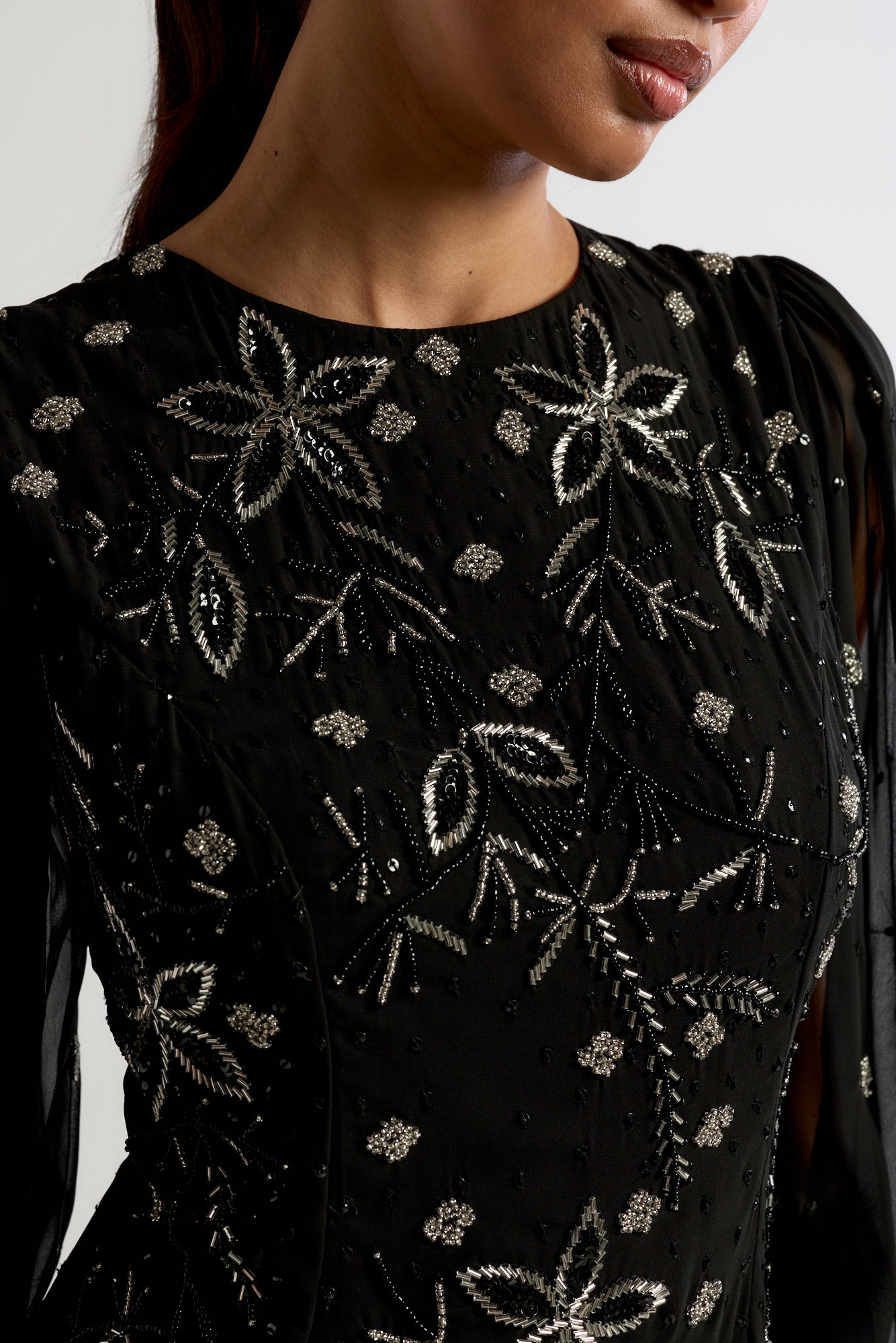 Frock and Frill Emilia black maxi dress with silver floral embellishment and modest floor-length silhouette