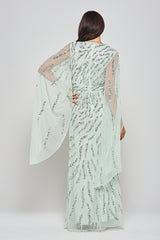 Genevieve mint green occasion maxi dress with silver sequin embellishment and statement sleeves.