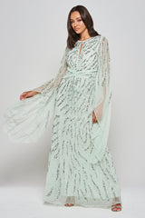 Genevieve mint green occasion maxi dress with silver sequin embellishment and statement sleeves.