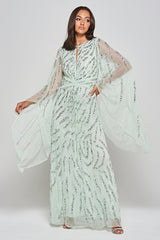 Genevieve mint green occasion maxi dress with silver sequin embellishment and statement sleeves.