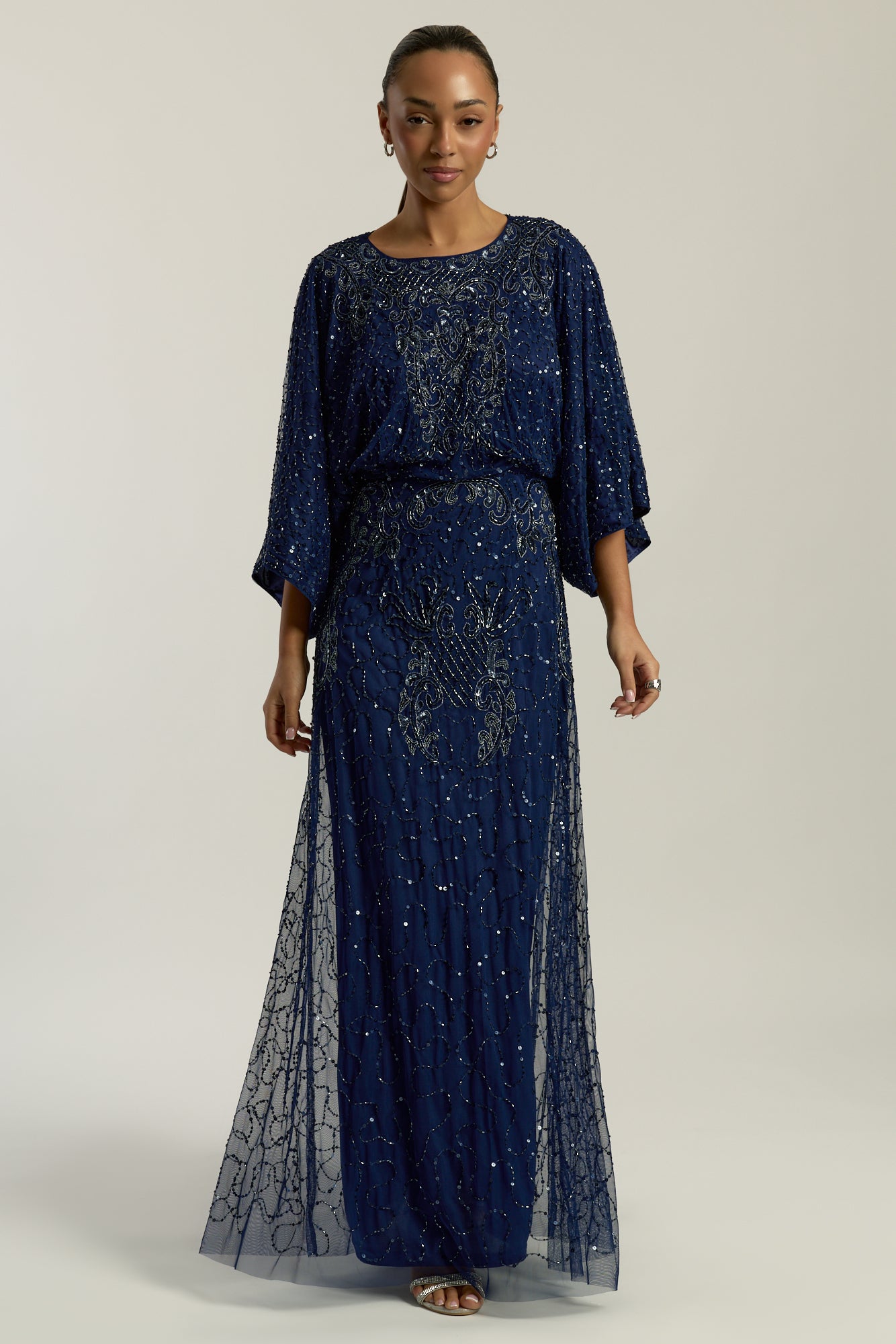 Judith Navy Embellished Maxi Dress with batwing sleeves, delicate beadwork, and flowing cape-style silhouette for weddings, evening events, and modest formal occasions