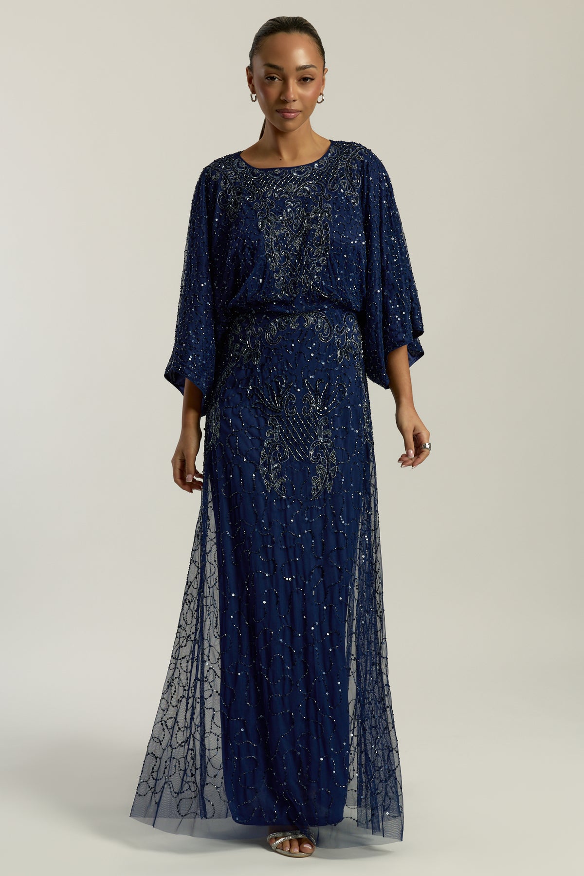 Judith Navy Embellished Maxi Dress with batwing sleeves, delicate beadwork, and flowing cape-style silhouette for weddings, evening events, and modest formal occasions