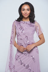 Lilla Lilac Embellished Asymmetric Cape Sleeve Maxi Dress by Frock and Frill, perfect for spring weddings and special occasions. 