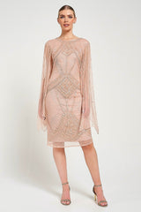 Liora blush embellished midi dress with intricate beading and sheer long sleeves. Perfect for parties and elegant evening occasions.