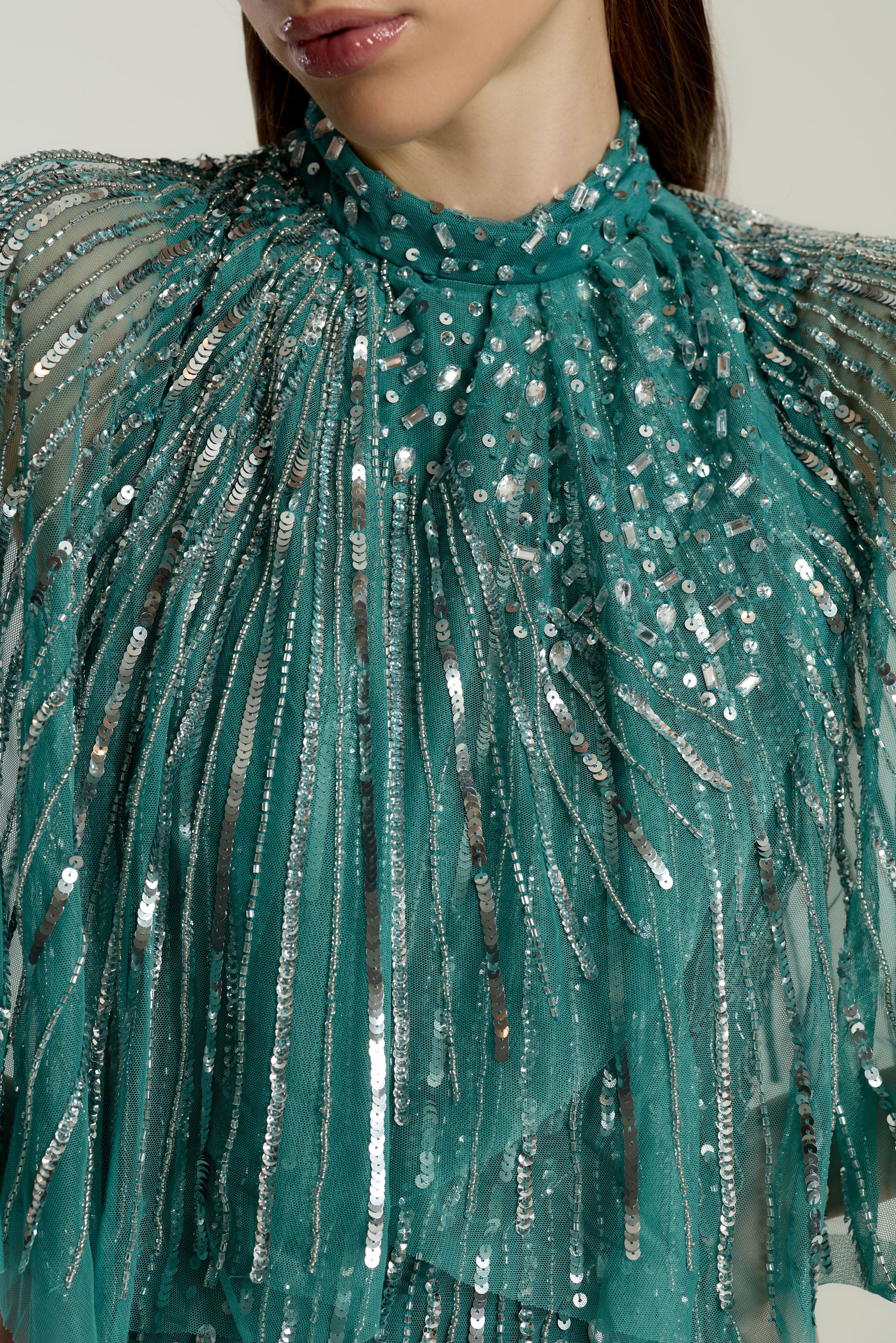 Lisette Teal Embellished Maxi Dress with Cape Detail, floor-length gown with all over beading and sheer cape sleeves, suitable for weddings and evening events