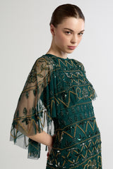Mahonia by Frock and Frill green embellished midaxi dress with cape sleeves. 