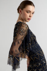 Navy Mahonia cape sleeve midaxi dress from Frock and Frill, fully embellished with sparkling beads, featuring a flowing skirt, perfect for weddings, parties, and modest evening occasions