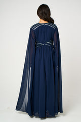 Marina navy embellished maxi dress with flowing silhouette and delicate bead detailing, ideal for weddings and formal occasions.