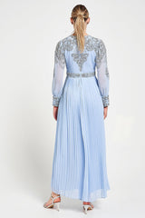 Meredith Blue Embellished Jumpsuit in ice blue with beaded bodice, long sheer sleeves and pleated wide-leg trousers for weddings and formal occasions.