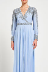 Meredith Blue Embellished Jumpsuit in ice blue with beaded bodice, long sheer sleeves and pleated wide-leg trousers for weddings and formal occasions.