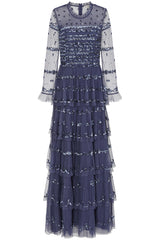 Nerissa dusty navy blue sequin tiered maxi dress with full-length sleeves, perfect for weddings, black tie balls and formal occasions. 
