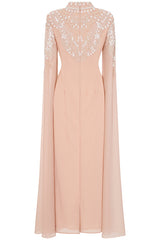Penelope blush cape maxi dress with white embellishments on bodice and cape sleeves, modest formal dress for weddings and spring occasions