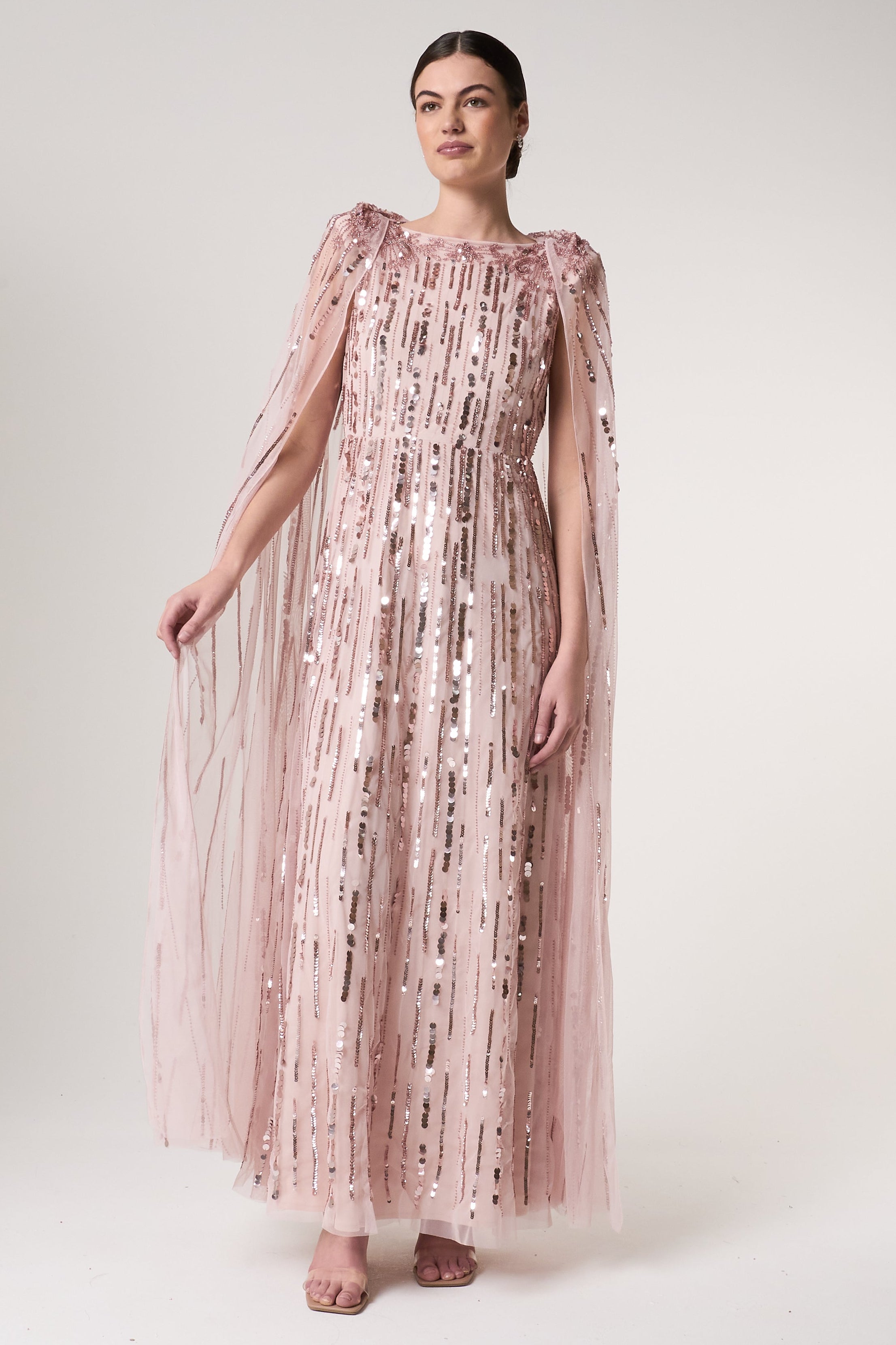 Peony pink embellished cape sleeve maxi dress with sheer long cape sleeves and cascading sequin detailing