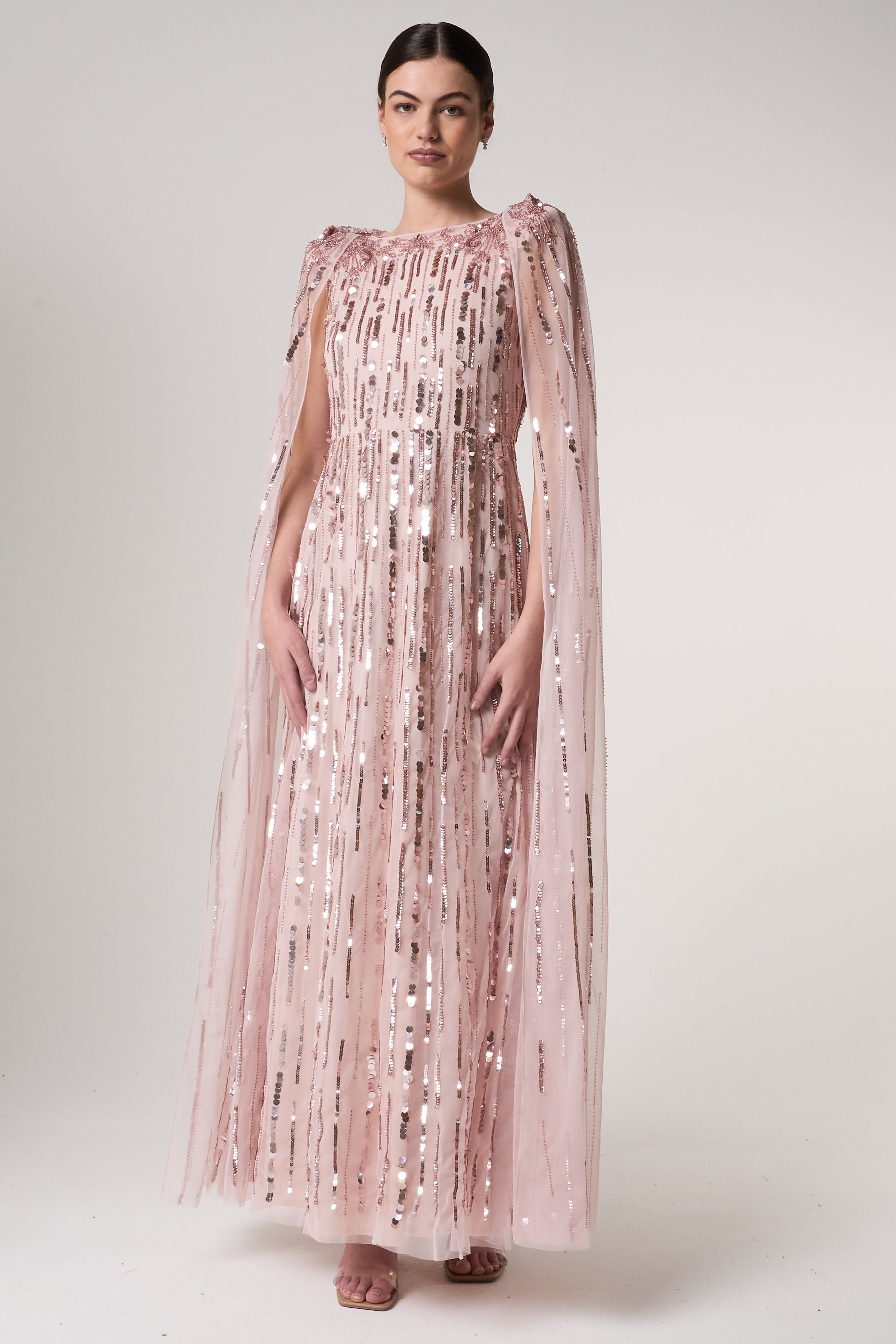 Peony pink embellished cape sleeve maxi dress with sheer long cape sleeves and cascading sequin detailing