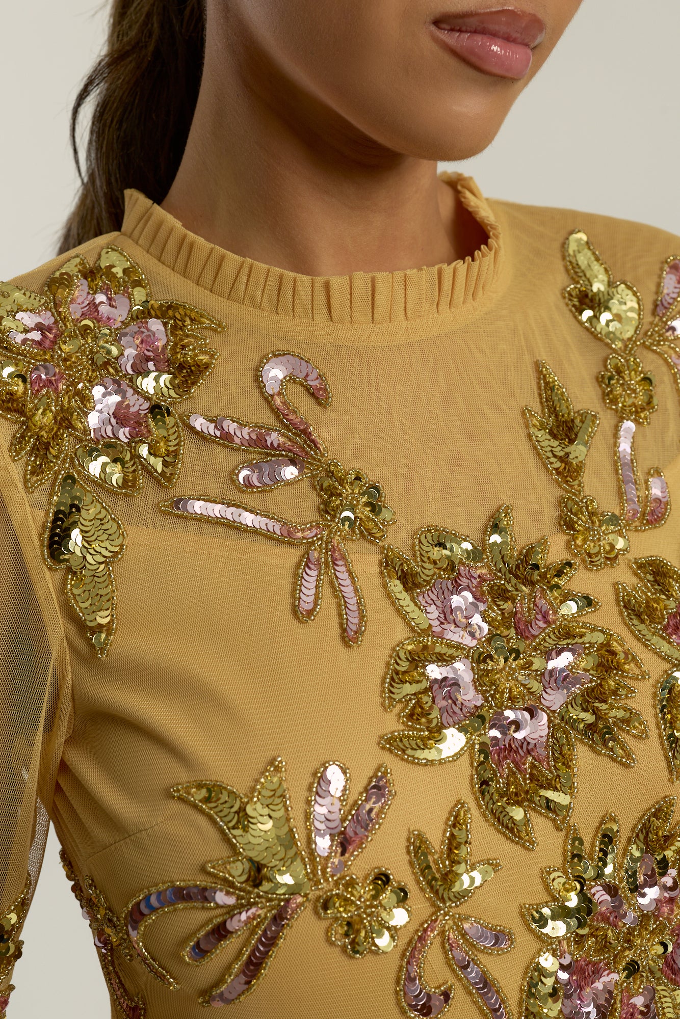 Saffron yellow gold embellished maxi dress with floral beading, sheer three-quarter sleeves and flowing skirt by Frock and Frill.