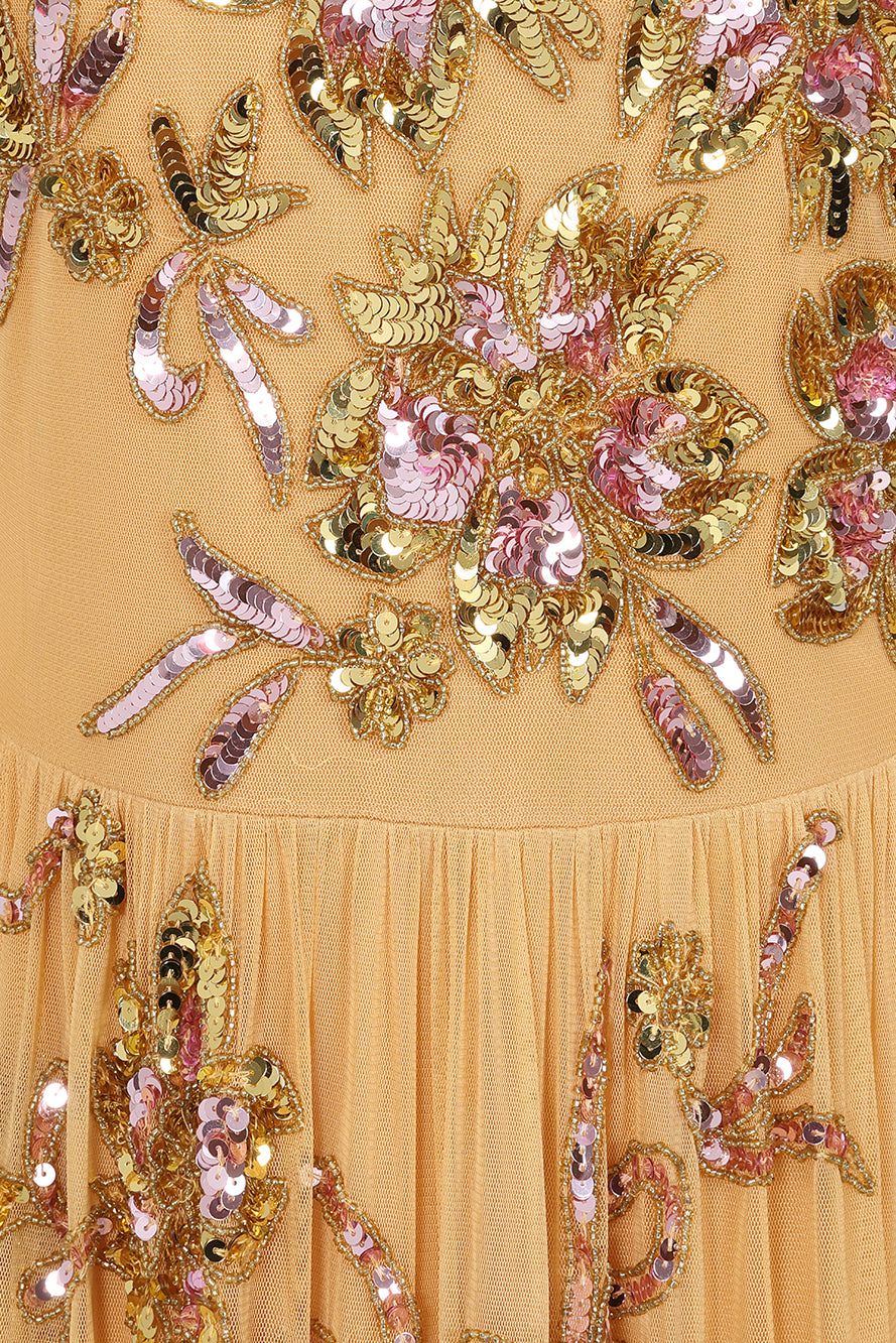 Saffron yellow gold embellished maxi dress with floral beading, sheer three-quarter sleeves and flowing skirt by Frock and Frill.