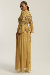 Saffron yellow gold embellished maxi dress with floral beading, sheer three-quarter sleeves and flowing skirt by Frock and Frill.