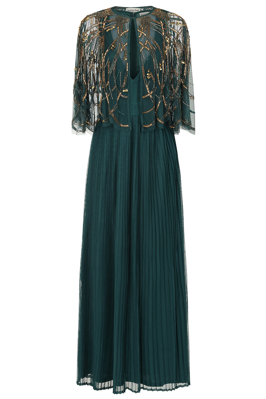 Green embellished maxi dress with flowing pleated skirt and detachable sheer cape overlay, featuring gold bead detailing and an elegant V-neck silhouette for occasion wear.