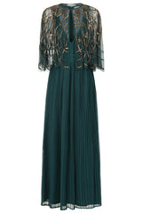 Green embellished maxi dress with flowing pleated skirt and detachable sheer cape overlay, featuring gold bead detailing and an elegant V-neck silhouette for occasion wear.