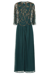 Green embellished maxi dress with flowing pleated skirt and detachable sheer cape overlay, featuring gold bead detailing and an elegant V-neck silhouette for occasion wear.