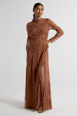 Solene bronze embellished maxi dress with high neckline, side split skirt, and open back, perfect for weddings, formal occasions, and evening events.