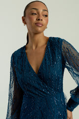 Velora skipper blue sequin midi dress with V-neckline, long sleeves, and fit-and-flare silhouette, perfect for evening events, weddings, and parties.