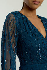 Velora skipper blue sequin midi dress with V-neckline, long sleeves, and fit-and-flare silhouette, perfect for evening events, weddings, and parties.