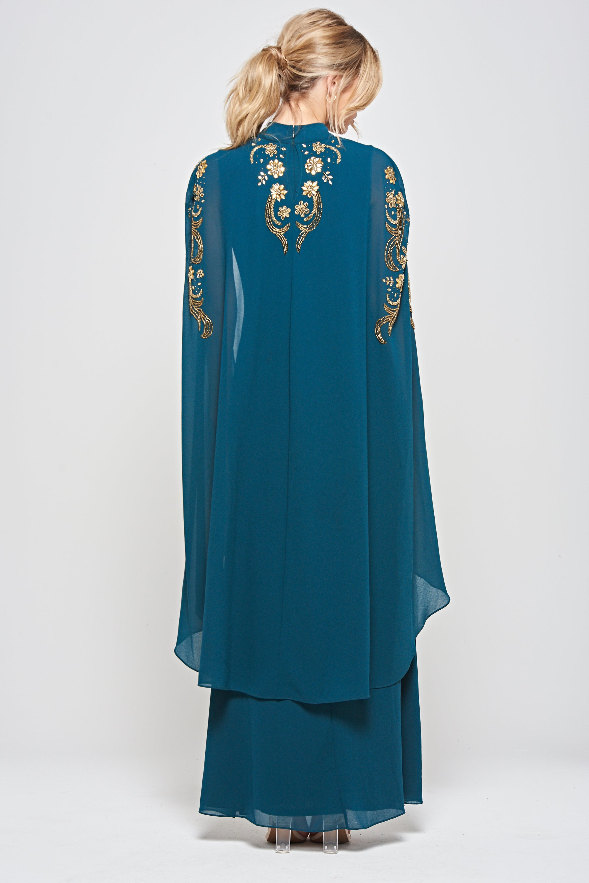 Zinnia dark green embellished cape sleeve maxi dress with high neckline and flowing floor-length skirt, elegant modest evening gown for weddings and formal occasions.
